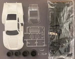 1/24 Martini Porsche 935-78 Moby Dick Unbuilt Kit Testors Fujimi. Fixed Price $52.00.