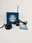 Wouxun KG-UV2D Radio With Charger. Fixed Price $90.00.