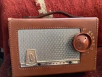 1956 Philco E-675-124 Sportster Tube-type Am Radio, Leather Case. Fixed Price $48.88.