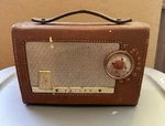 1956 Philco E-675-124 Sportster Tube-type Am Radio, Leather Case. Fixed Price $30.00.